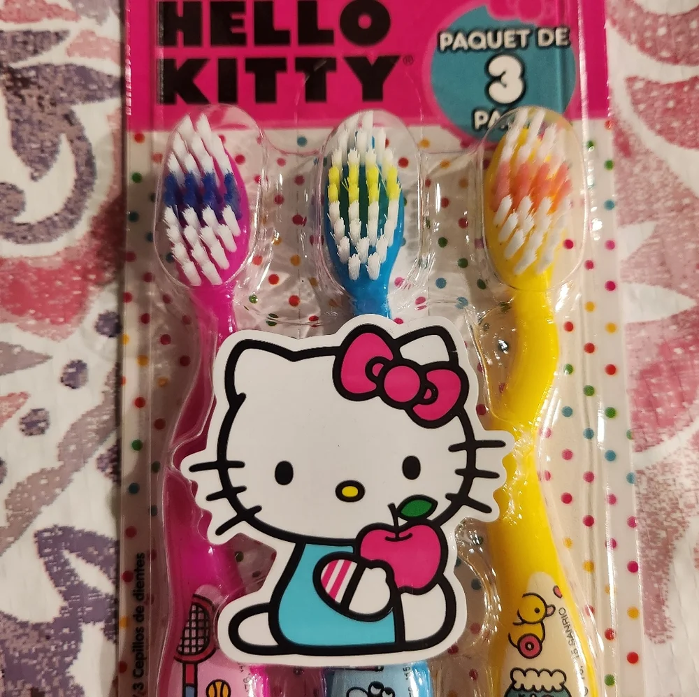 4 Piece Sanrio Hello Kitty 1 Toothbrush case holder 3 Kids Toothbrushes Soft NWT